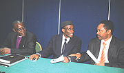 RELIGIOUS CHAT : L -R Rev. Faustin Bashaka , Sheikh Saleh Habimana and  Dr. Anastase Shyaka chat at Hotel Novotel. (Photo/ J. Mbanda).