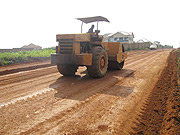 A tractor grading Kabeza road. KCC wants to raise funds through a municipal bond to finance infrastructure development. (File photo)