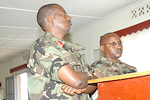 WAITING TO EXHALE: Brig. Gen. Wilson Gumisiriza and Maj. Wilson Ukwishaka at the Military Tribunal of Kigali before they were acquited yesterday. (Photo / G.Barya).