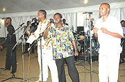 A local cultural band led by Rwandau2019s famous singer and songwriter, Intore Masamba, performing during UNu2019s 63rd anniversary at Jali Club. (Photo: G. Barya).