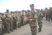 Chief of Defence Staff, Gen. James Kabarebe welcomes the 51st Batallion back home from Darfur at Kigali International Airport yesterday. (Photo/ J. Mbanda).