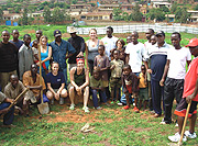 The Canadian interns with some of the volunteers after the tree planting excercise. (Photo/ F.Mutesi).