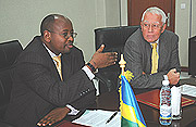 Finance Minister James Musoni makes a statement before the signing,  Right is Head of EU Commission to Rwanda David MacRae. (Photo/ J Mbanda).