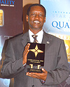 BK Managing Director James Gatera, holding the award.