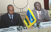 Justice Minister Tharcise Karugarama (R) and the African Union Commissioner for Economic Affairs Dr. Maxwell Mkwezalamba at a Press briefing on Monday (Photo/ J. Mbanda)