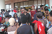 First Lady Jeannette Kagame (C) greets women after openning the National Roundtable of Women Entrepreneurs at Prime Holdings yesterday. (Photo J. Mbanda).