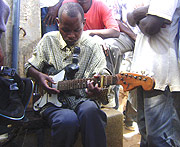 Hagenimana entertains his fans in Remera. (Photo / S. Tumnsiime).
