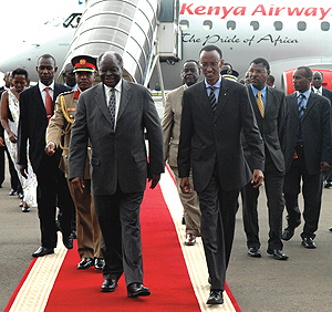 President Mwai Kibaki being received by President Paul Kagame at Kanombe International Airport.(PPU photo)