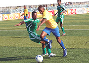 Amavubi Star Patrick Mutesa Mafisango in action during last yearu2019s Cecafa Cup. The centre of the park kingpin is expected to be an integral part inTucaku2019s plans.(File photo)