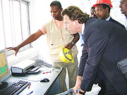 Dutch minister of   International Development cooperation, Bert Koenders, being briefed about  the Gisenyi methane gaz project  while  Minister Butare look on. (Photo / M. Tindiwensi).