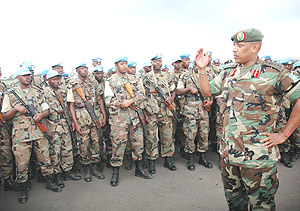 Major General Patrick Nyamvumba addesses troops  of the 35th Bn upon their return from Darfur. (Photo / J.Mbanda).