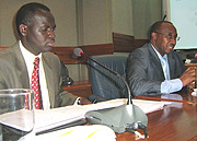 L-R: Stanslas Kamanzi and Protais Musoni explain to the Senate yesterday. (Photo / E.Kwibuka).