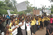 Members of KVCS demonstrate at the German Embassy in Kigali. (Photo/ J. Mbanda)