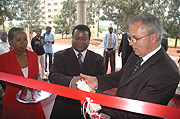 KIST Rector Abraham Atta Ogwu (C) and Helmut J Schmidt (R) cut the tape at the inauguration. (Photo/ J Mbanda)