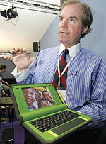 Nicholas Negroponte proudly displaying his u2018Childrenu2019s Machineu2019.