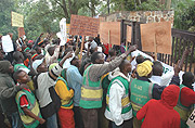 Members of ASSETAMORWA, an association of motorcyclists Demonstrate at the German Embassy entrance in Kiyovu. (Photo/ J. Mbanda).