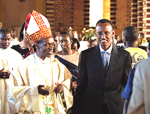 President Kagame leaving Rwamagana Church with Monsignor Kizito Bahusemihigo.(PPU Photo).