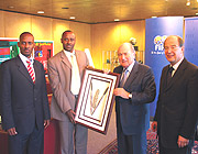Connecting very well: Ferwafau2019s Jules Kalisa (L), Brig. Gen John Bosco Kazura meeting with Fifa president Sepp Blatter (C) during Kazurau2019s first visit to Zurich as Ferwafa president.