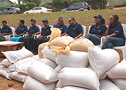 SOCIAL RESPONSIBILITY : ECO-Bank  Staff members and their donations. (Photo/ E.Mukaaya).