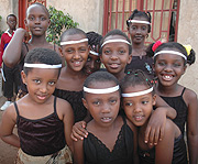 Children prepare to perform a traditional dance at Kimironko. (Photo/ J. Mbanda)