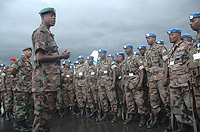 CDS, Gen.James  Kabarebe addresses the last batch of the 51st bn troops on their arrival from Darfur at Kigali International Airport. (Photo J Mbanda).
