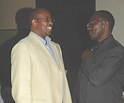 Minister of Finance and Economic Planning James Musoni chatting with MTN Rwanda Coo Andrew Rugege as at Hotel Serena. (Photo/G.Barya).