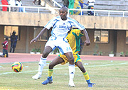 A Somalia player battles for the ball in their game against Zanzibar (Photo / A. E.Oryada)