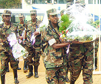 Students from the Rwandan Diaspora prepare to lay a wreath on a mass grave at Nyamata Genocide Memorial Site. (Photo / S. Nkurunziza).