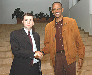 President Paul Kagame with British Minister Douglas Alexander after their meeting at Urugwiro Village yesterday. (PPU Photo).