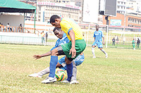 Amavubi striker Bokota Kamana beats off a challenge from a Somalian defender. The striker is set to retain his starting place today. (Photo / A. E. ORYADA)