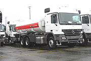 Trucks transporting fuel.