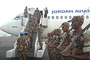 RDF peacekeepers boarding a plane to Darfur. (File Photo).