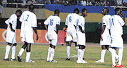 BROKEN HEARTS: Dejected Rwanda players look on after conceding the third goal in their first game against Uganda. Rwanda was pinned to the last semifinal place by Tanzania last night.Uganda beat Tanzania 2-1 . (Photo / A. E. ORYADA)