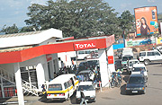 Cars at a filling station waiting  for Fuel. (File Photo).