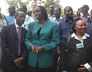 State Minister for Agriculture Agnes Karibata (C), Jane Ininda of Alliance Green Revolution in Africa (AGRA) (R) and ISAR Director General Mark Bagabe (L) with other participants of the Legume Breeders meeting at Serena Hotel yesterday (Photo/ J. Mbanda)
