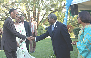 President Paul Kagame greets Defence Minister Gen. Marcel Gatsinzi as he hosted senior army and Police officers to a new yearu2019s party at Urugwiro Village Yesterday. (Photo/ J. Mbanda).