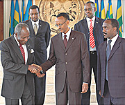 President Kagame shakes hands with Dr Martin Aliker the Board Chairman NMG while Linus Gitahi the Group CEO looks on. (Photo G Barya).
