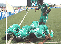 FAVORITES: Nigeriau2019s players celebrate one of their goals against Egypt. Nigeria won 2-0. (Photo / G. Barya).