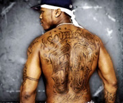 50 Cent has tattoos covering his back.