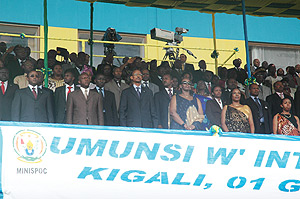 President Kagame flanked by other dignatories during celebrations to mark Heroes Day yesterday at Amahoro Stadium. (Photo G. Barya)