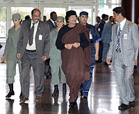 Muammar al-Gaddhafi, Libyan President heavily guarded.