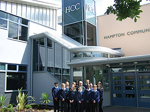 Students of Hampton Community College pose in front of their school. (Courtesy photo)