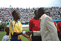 Jimmy Gatete greeted by sports minister Joseph Habineza before a Rwanda vs Cameroon game in 2006 ACN qualifiers.
