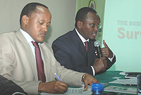 Secretary General Private Sector Federation Emmanuel Hategeka and Director of East African Bussiness Council Faustin Kananura at the launch yesterday. (PhotoGBarya).