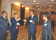 Commonwealth Deputy Secretary-General Masire-Mwamba (right) with President Paul Kagame (2nd from right) and the Secretary-General of the East African Community Mwapachu (2nd from left) and Ayo Oke, Head of Africa Section in the Political Affairs Division.