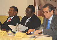 L-R: Secretary General of COMESA Sindiso Ngwenya, Prime Minister Makuza and Nestor Osorio, the Executive Director of the International Coffee Organisation. 