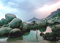 From a beach by Cape Town, a view of Table Mountain.