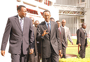 President Kagame with EALA Speaker Abdirahin Abdi at the EAC headquarters at the Arusha International Conference Centre yesterday. (Courtesy Photo).