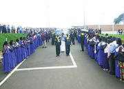 The car carrying Pastor Rugerinyangeu2019s  body being guided out of Airport after its arrival from India. (Photo E Mutara).
