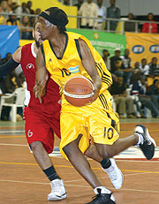Rwandau2019s Hamza Ruhezamihigo takes on Egyptu2019s Tamer Mohammed in the final game of the regional Zone V qualifiers yesterday at Amahoro indoor stadium. (Photo / G. Barya)